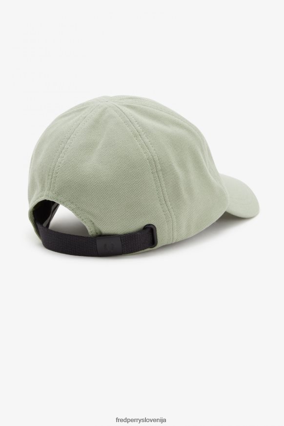 Detajli Fred Perry kape Fred Perry kapa - detajl lovorovega venca
