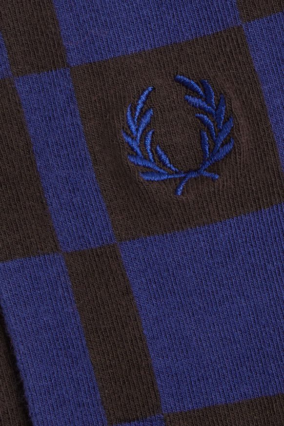Detajl šahovskih nogavic Fred Perry