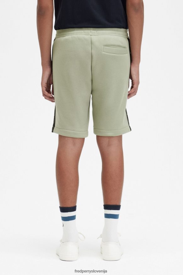 Detajl reliefnega traku na Fred Perry hlačah