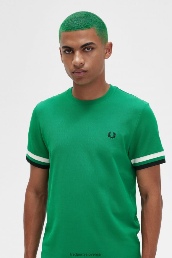 Detajl vezenega logotipa Fred Perry