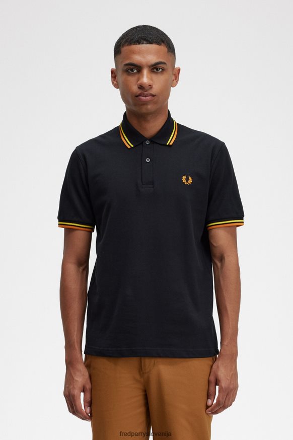 Fred Perry M12 Polo Majica Fred Perry M12 črna polo majica s cyber rumenimi in oranžnimi detajli