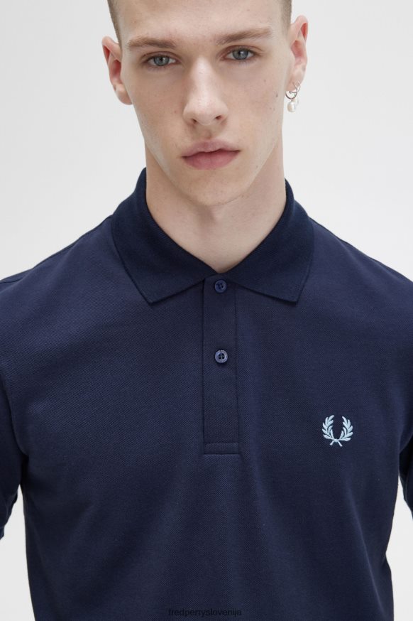 Fred Perry polo majica v kombinaciji z drugo oblačila